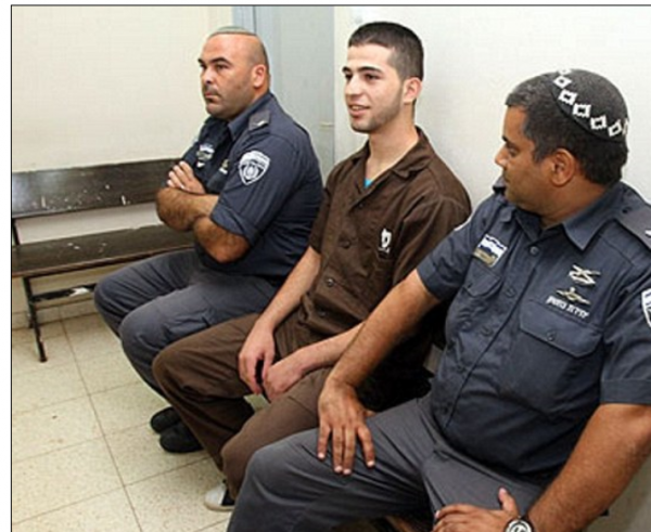 Hakim Awad, center| 5 life sentences for the murder of five members of the Fogel family while they slept, including children ages 11, 4, and 2 months | Credit: Daily Mail